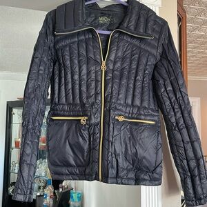 Michael Kors light pack able puffer jacket. size small. dark navy.